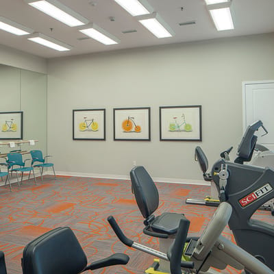 Interior view of a fitness room with exercise equipment