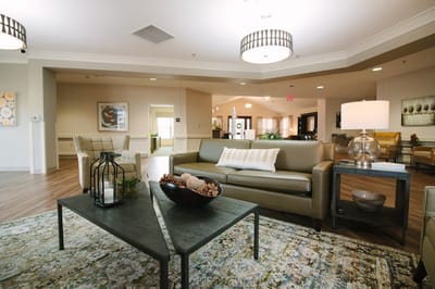 Bright and inviting common area with seating and decor