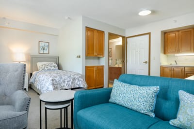 A cozy resident room with a comfortable setup