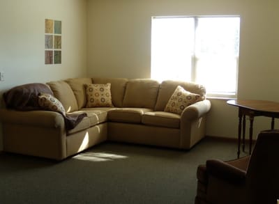 Bright, inviting living area with comfortable seating