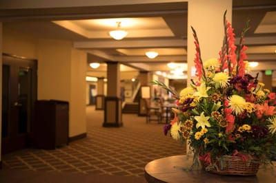 Bright interior with floral arrangements in a common area