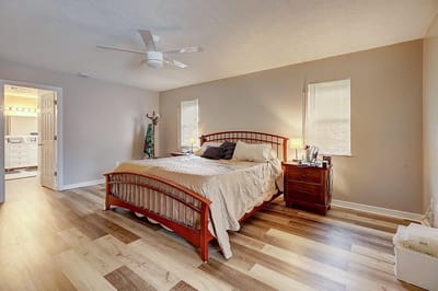 Well-furnished private bedroom in a senior living facility