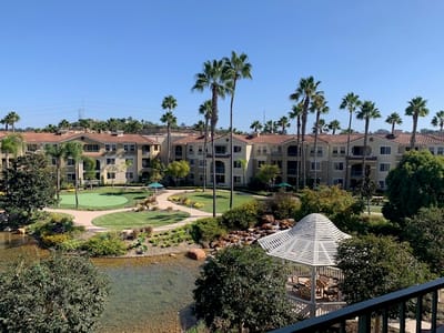 View of a landscaped area with buildings in the background
