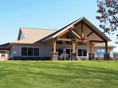 Exterior view of the facility showcasing architecture and lawn
