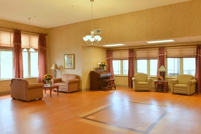 Bright common area with seating and windows
