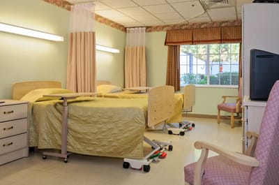 Interior view of a shared resident room with beds