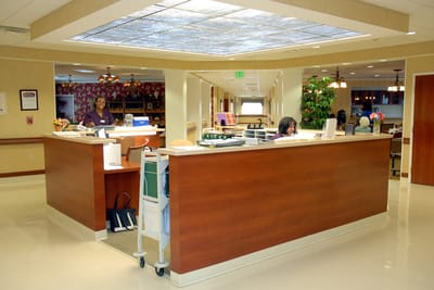 Reception area with staff members assisting
