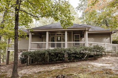 Exterior view of a senior living facility with porch