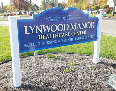 Sign for Lynwood Manor Healthcare Center outside the facility