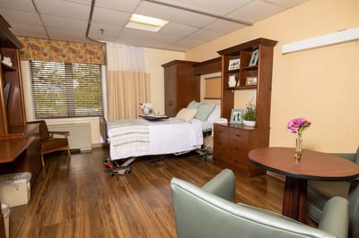 Well-furnished private resident room with sunlight