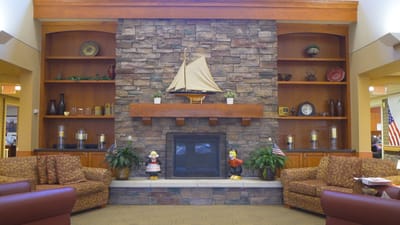 Cozy lounge area with decorative fireplace