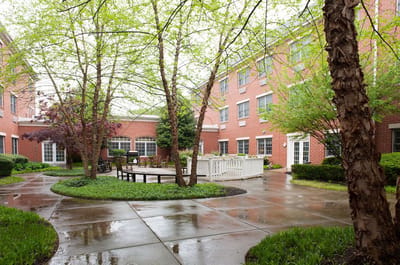Serene outdoor courtyard with seating and walkways
