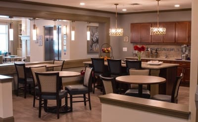 Modern dining area with tables and chairs