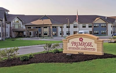 Exterior view of Primrose Retirement Community with signage