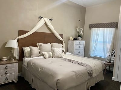 Well-furnished bedroom in an independent senior living apartment
