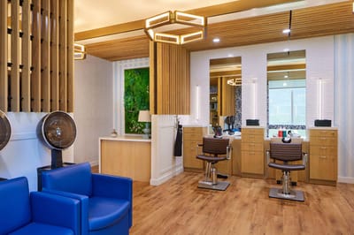 Bright and modern salon area with styling chairs