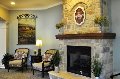Cozy common area with a fireplace and seating