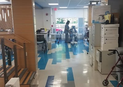 Activity room with staff assisting residents