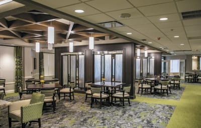 Interior dining area with tables and chairs