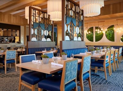 Bright dining area with modern decor and table settings