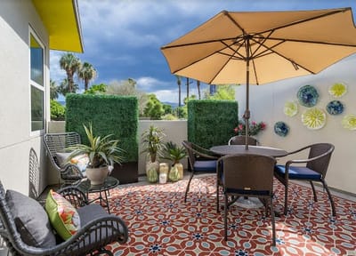 Outdoor patio with seating and decorative plants