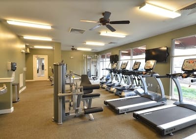 Interior view of a fitness room with exercise equipment