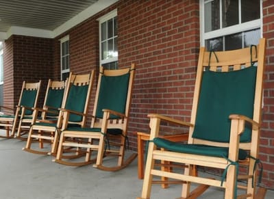 Row of rocking chairs on a porch