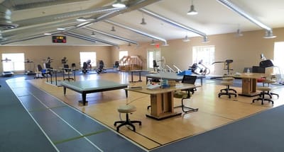 Interior view of a gym area with exercise equipment