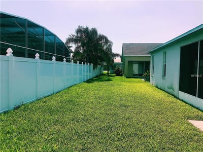 Garden view with grass and trees in a facility yard