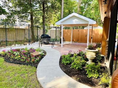 Beautiful outdoor space with flowers and a gazebo