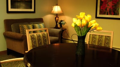 Cozy lounge area with yellow tulips on a table