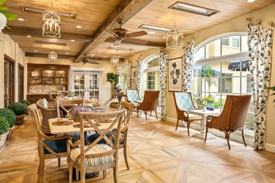 Bright common area with comfortable seating and large windows