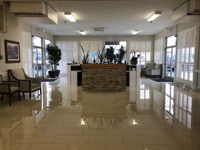 Bright interior lobby with plants and seating