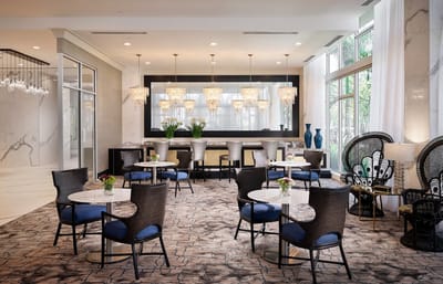 Elegant common area with tables and chairs