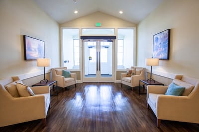 Bright lobby area with seating and natural light