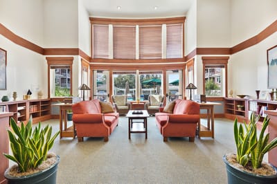Bright common area with seating and natural light