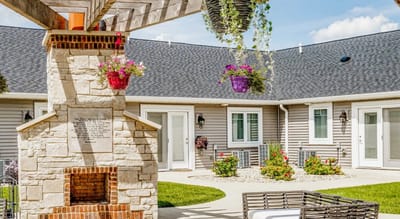 Outdoor courtyard with seating and flowers