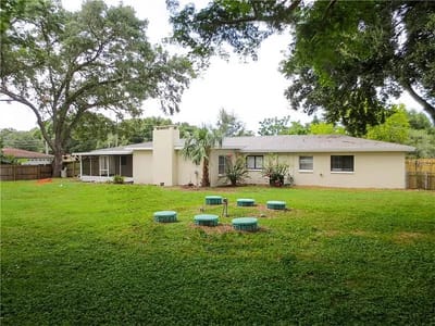 Exterior view of a senior care facility with garden