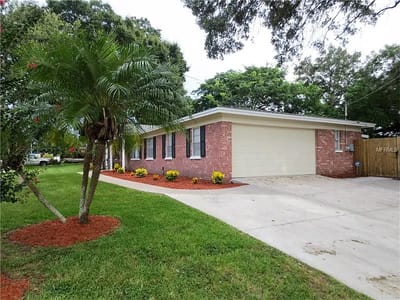 Exterior view of a nursing home facility with landscaping