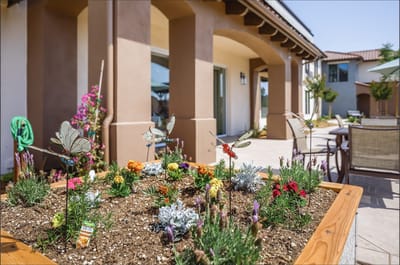 Flower garden with decorative butterflies at a facility
