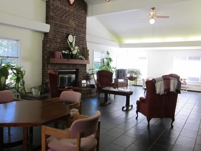 Cozy common area with a fireplace and seating