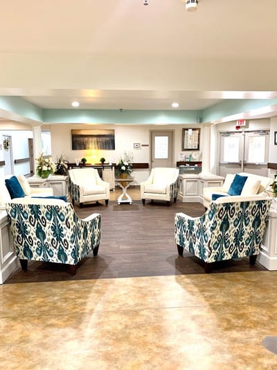 Bright communal lounge with comfortable seating