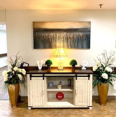 Decorative interior space with plants and art