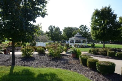 A beautiful outdoor garden area with a gazebo