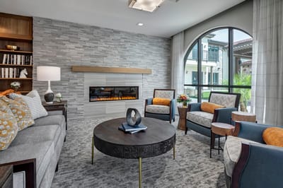 Cozy common area with seating and fireplace