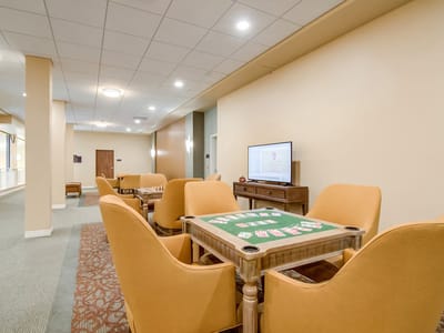 Interior view of a common area with game tables