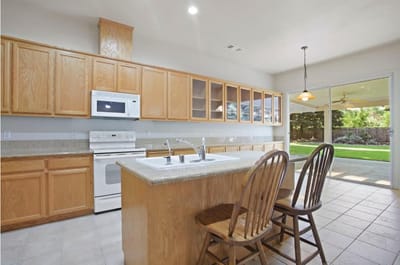 Bright kitchen area with outdoor view