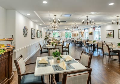 Dining area with tables set for meals