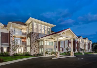 Exterior view of the Fieldstone at Chester Springs facility at dusk