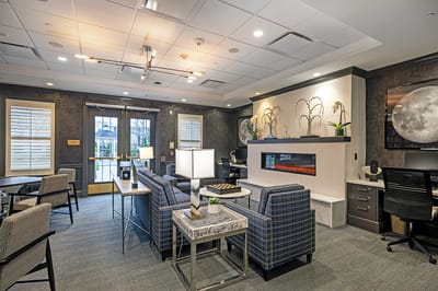 Interior lounge area with comfortable seating and fireplace